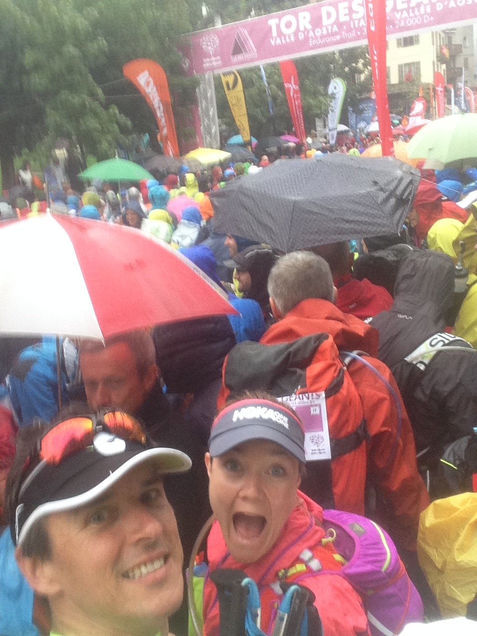 At the starting line with Jess, and some umbrellas. 